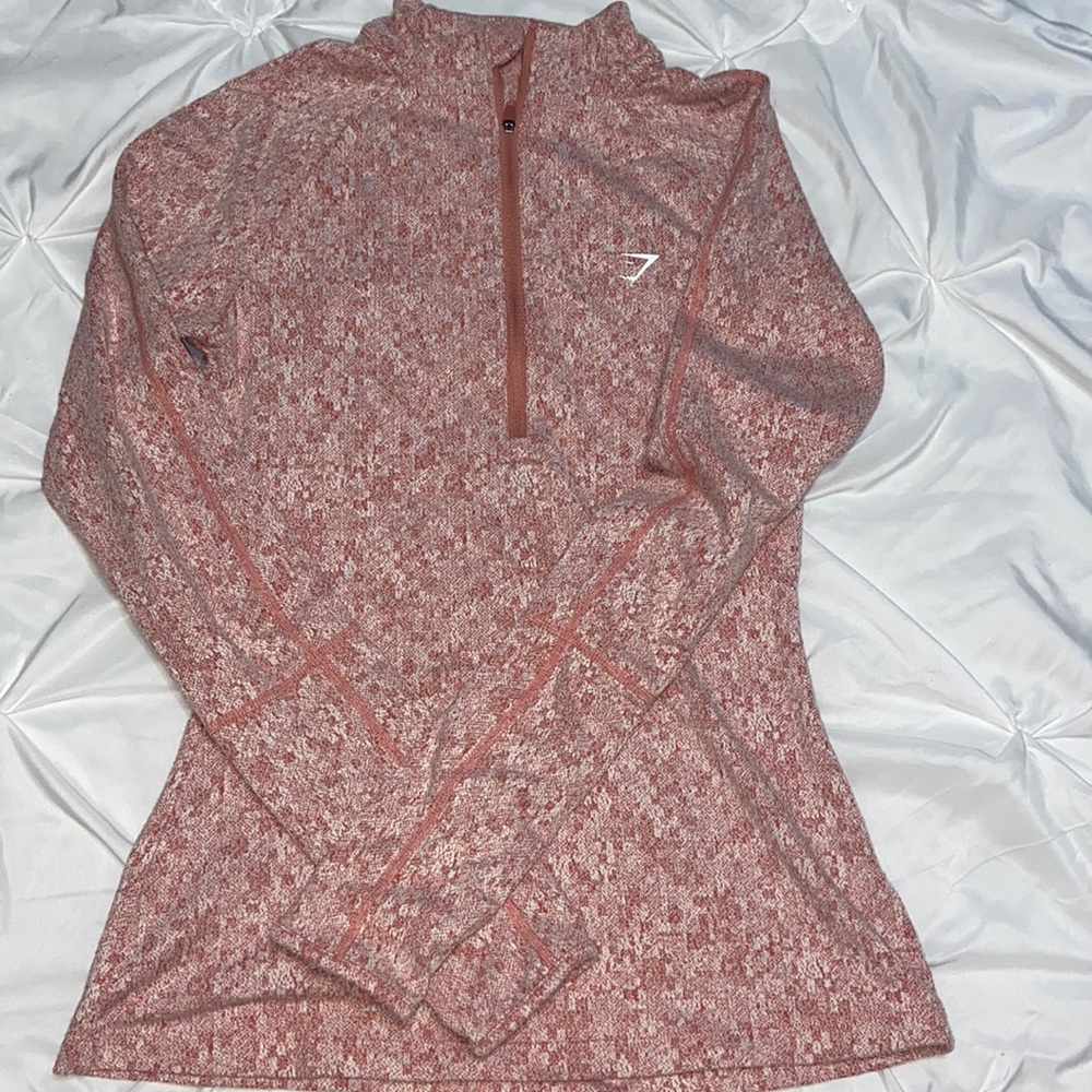 Gymshark half zip pullover with back cut-out.